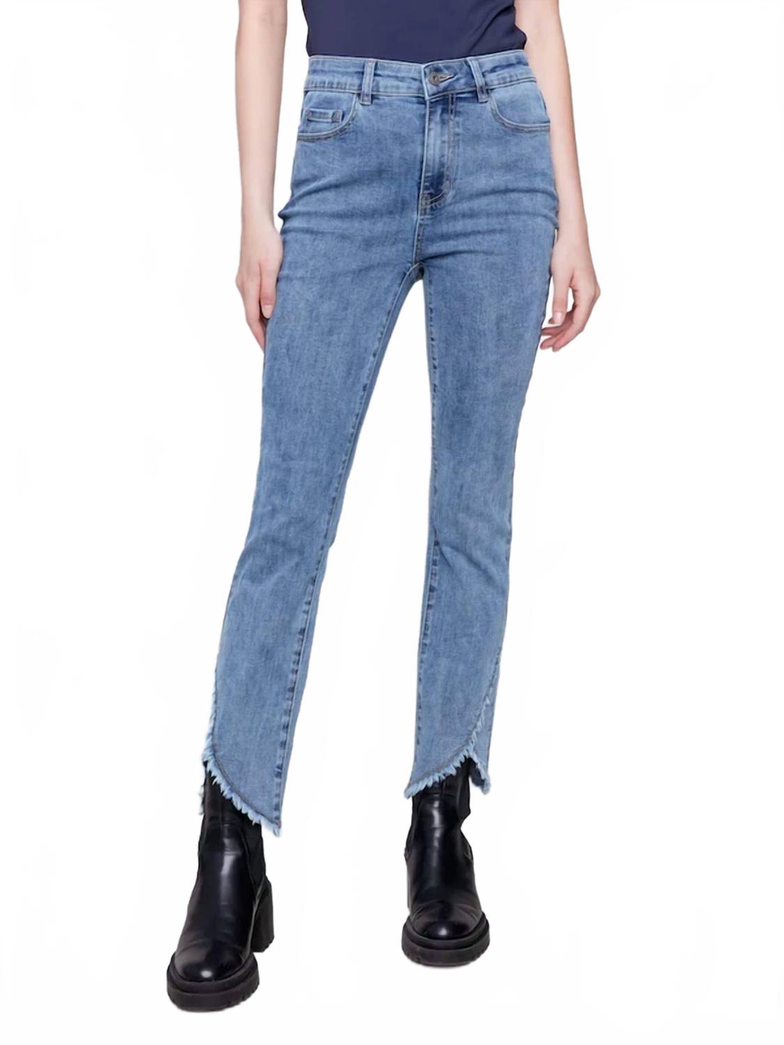 Straight Leg With An Asymmetrical Hem Jeans In Blue