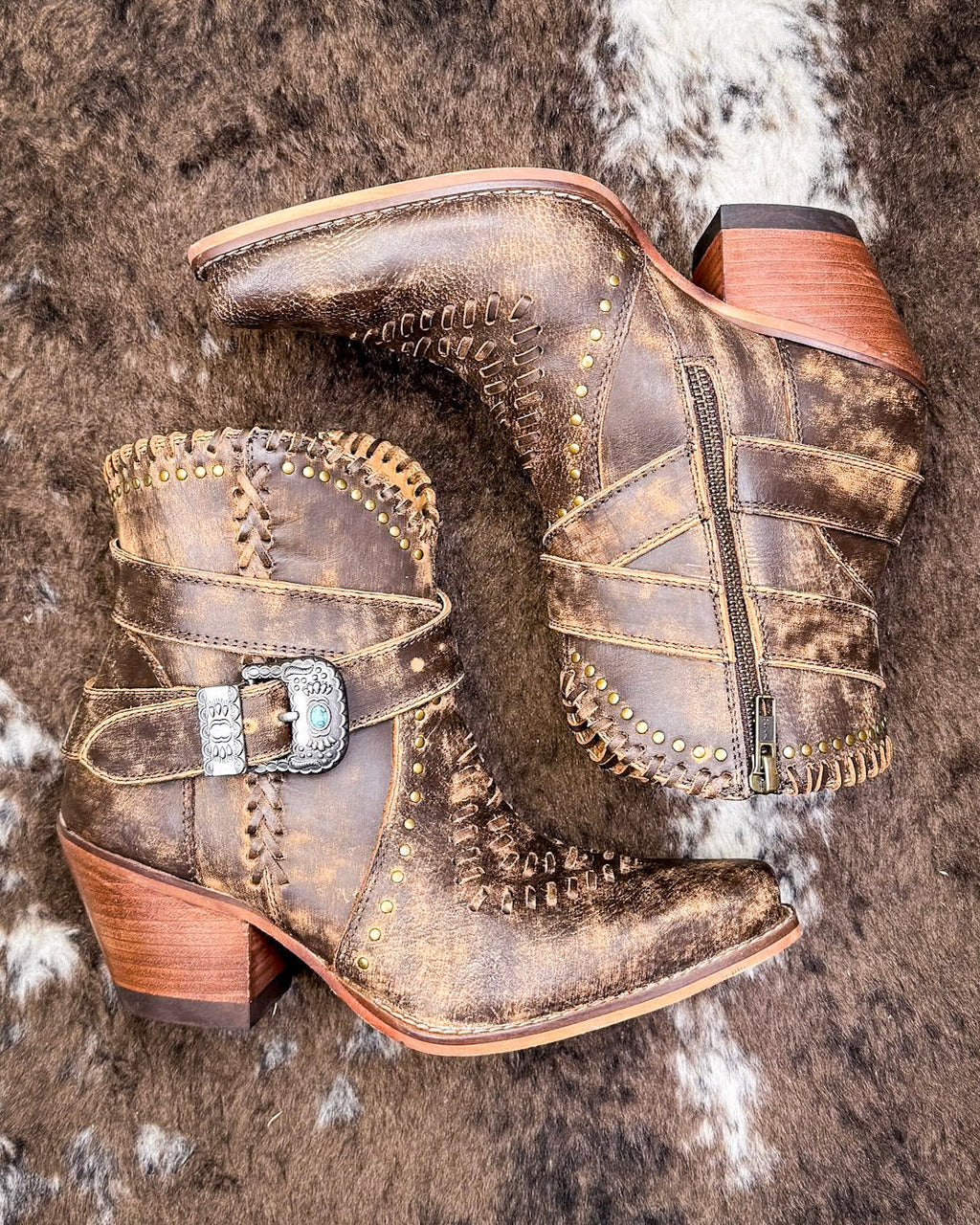 Haley's High Peak Booties by Myra Bag