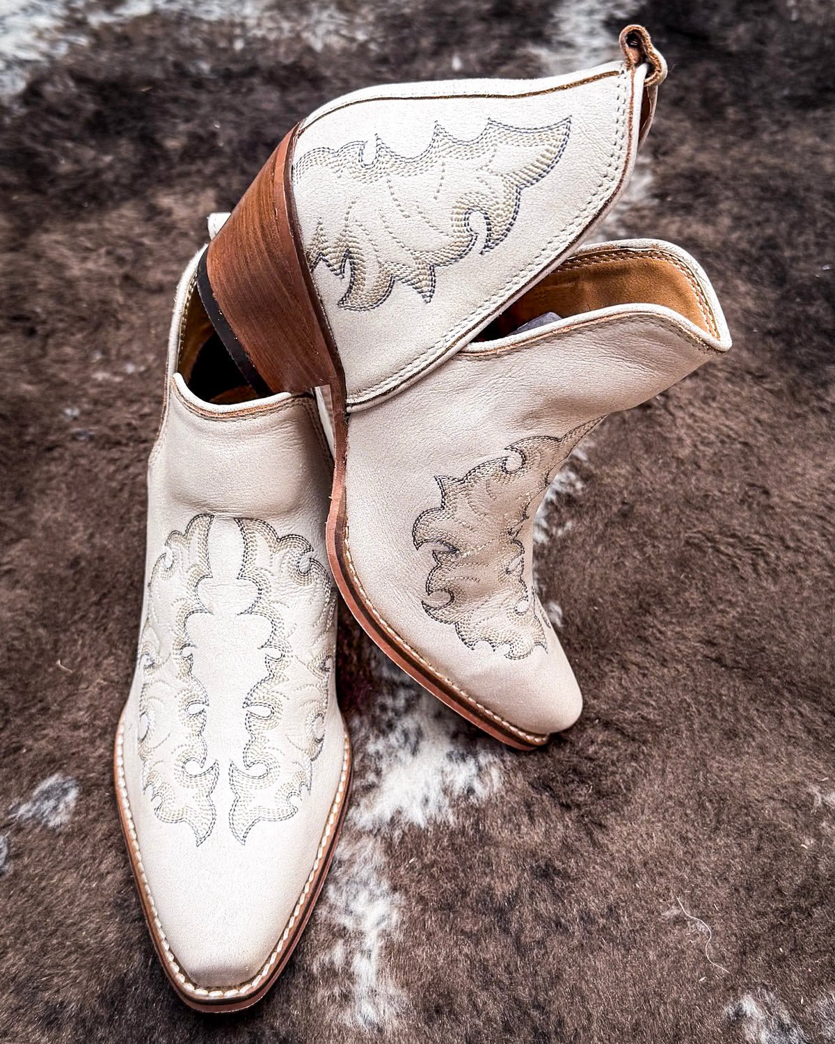 Western Ember Booties in White by Myra Bag