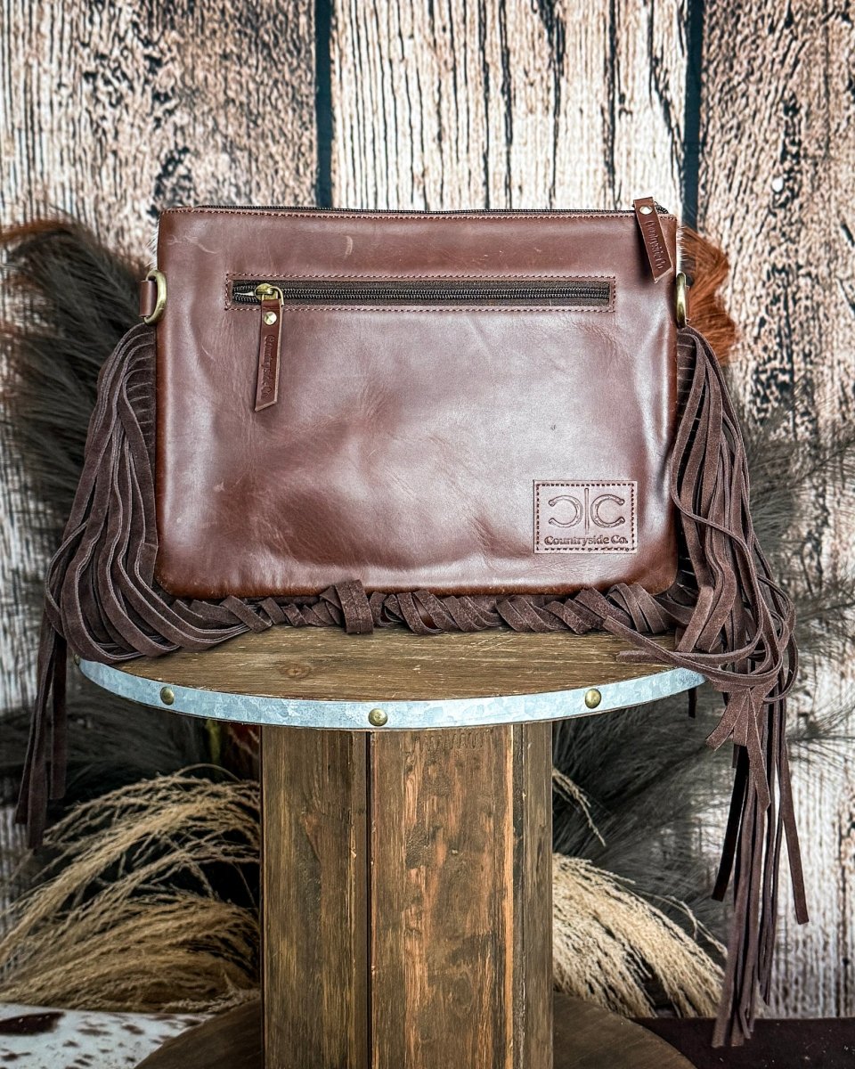Vegas Vintage Rodeo Buckle Leather and Hide Crossbody Bag by Countryside Co.